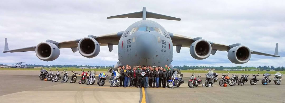 Green Knights MMC Ch 3 members in front of Air Force plane